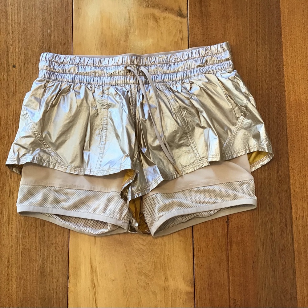 Stella McCartney gold shorts